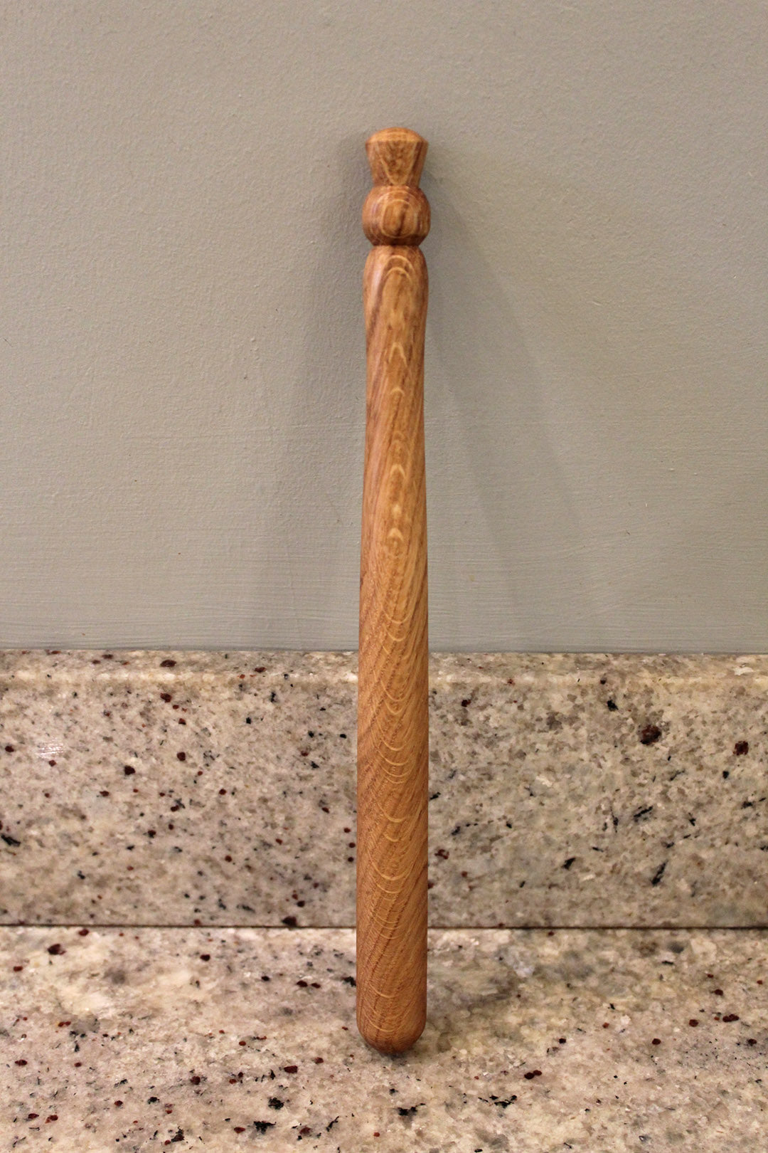Porridge spurtle carved from Oak. Scottish Textiles Showcase.
