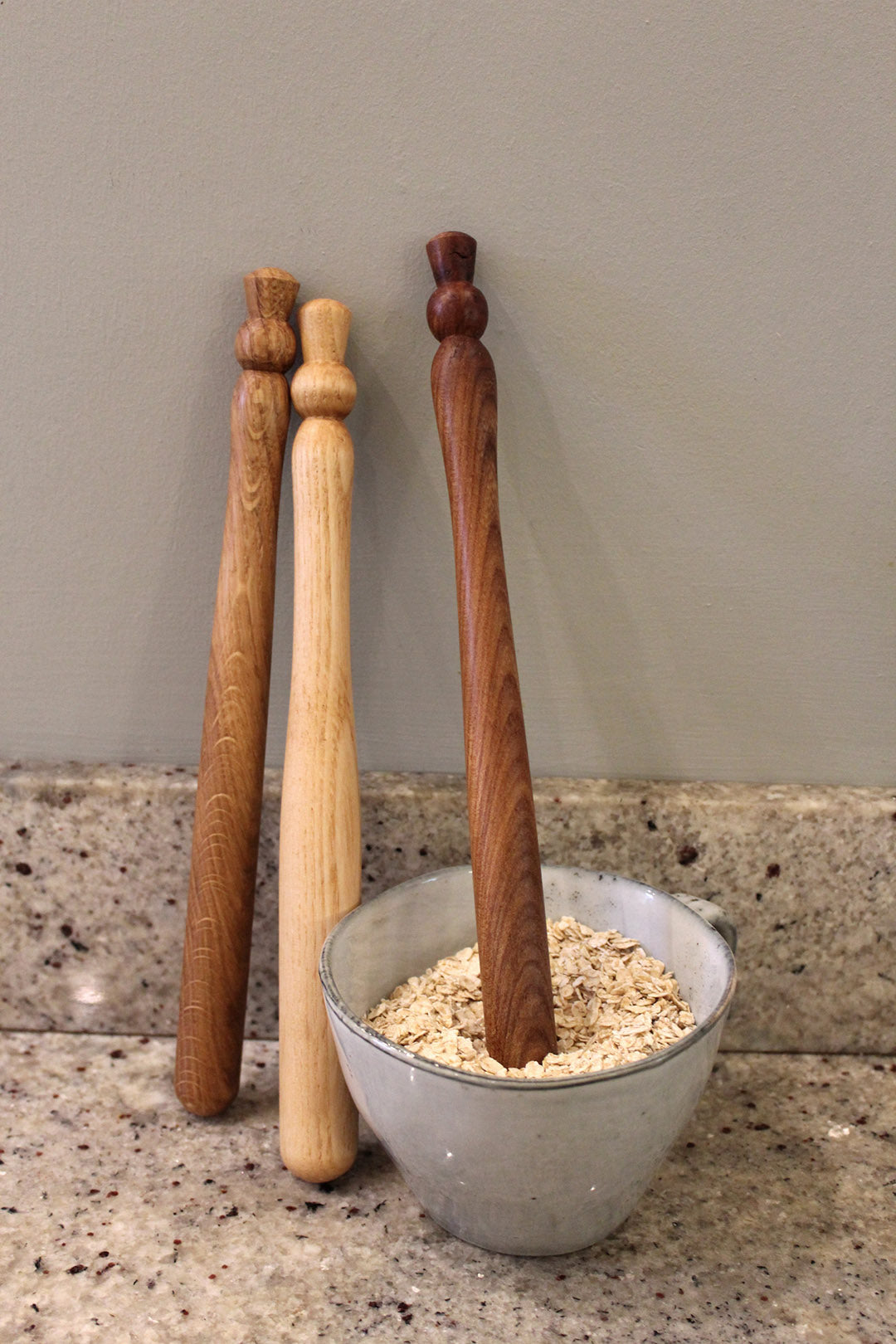 Spurtles in Oak, Elm and Ash pictured with oats. Scottish Textiles Showcase.