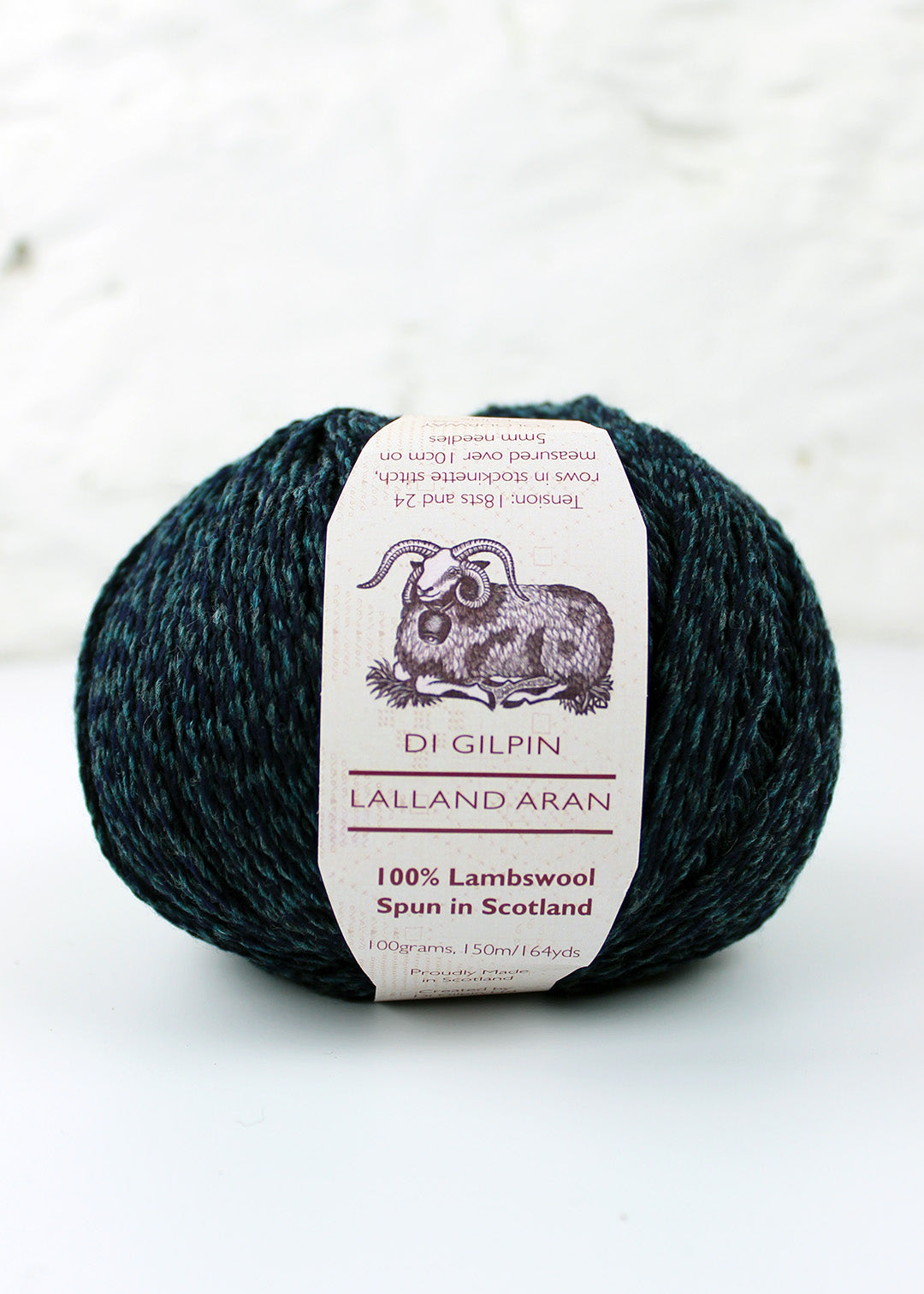 Aran weight pure lambswool in deep teal hue.