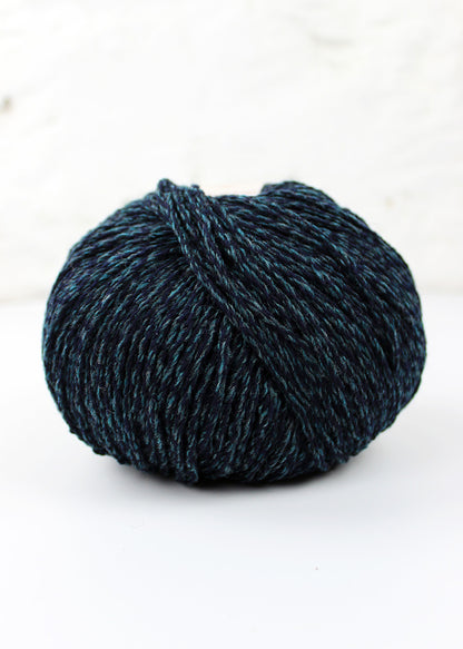 Aran weight pure lambswool in deep teal hue.