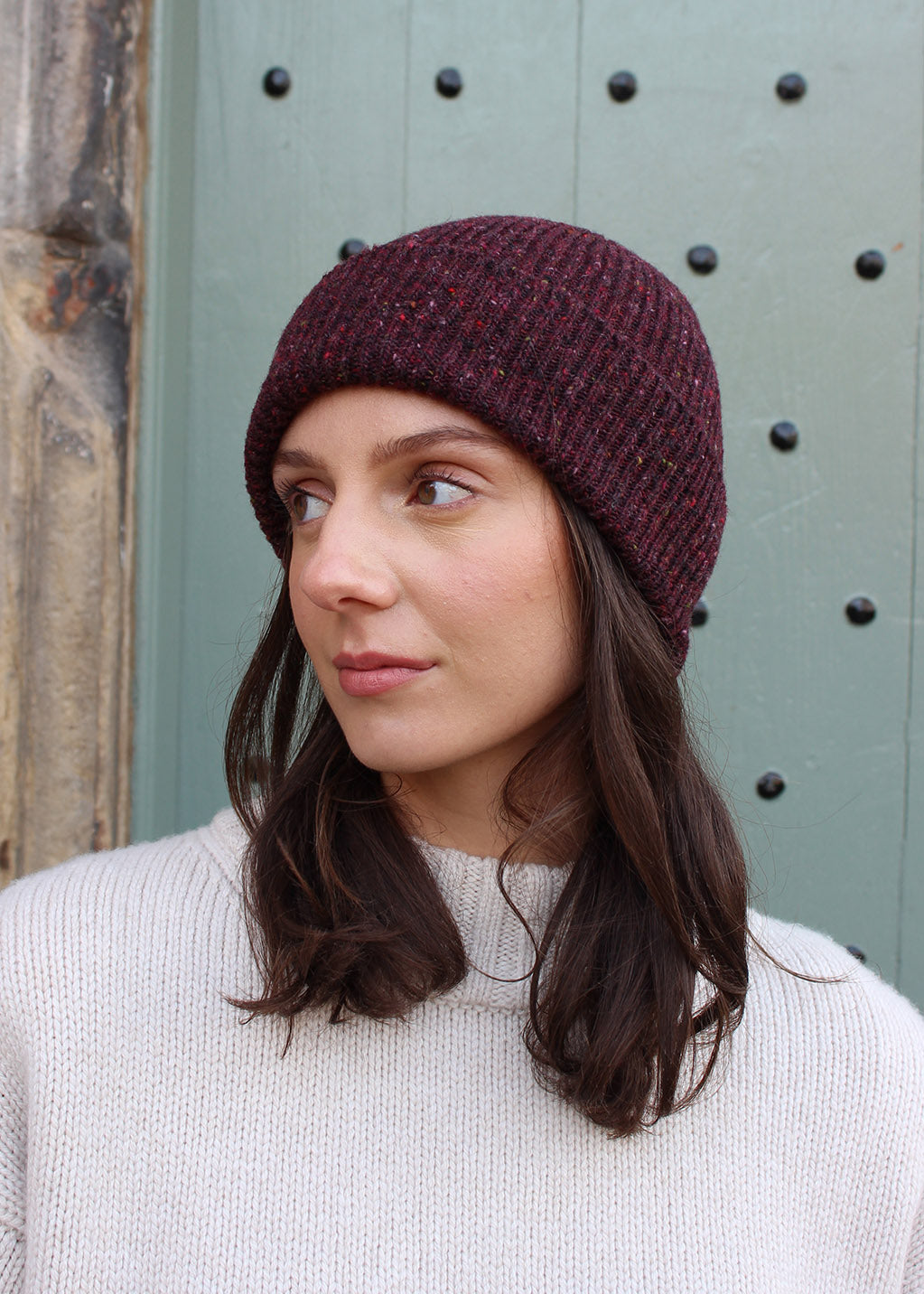 Wool ribbed beanie in flecked donegal burgundy. Scottish Textiles Showcase.