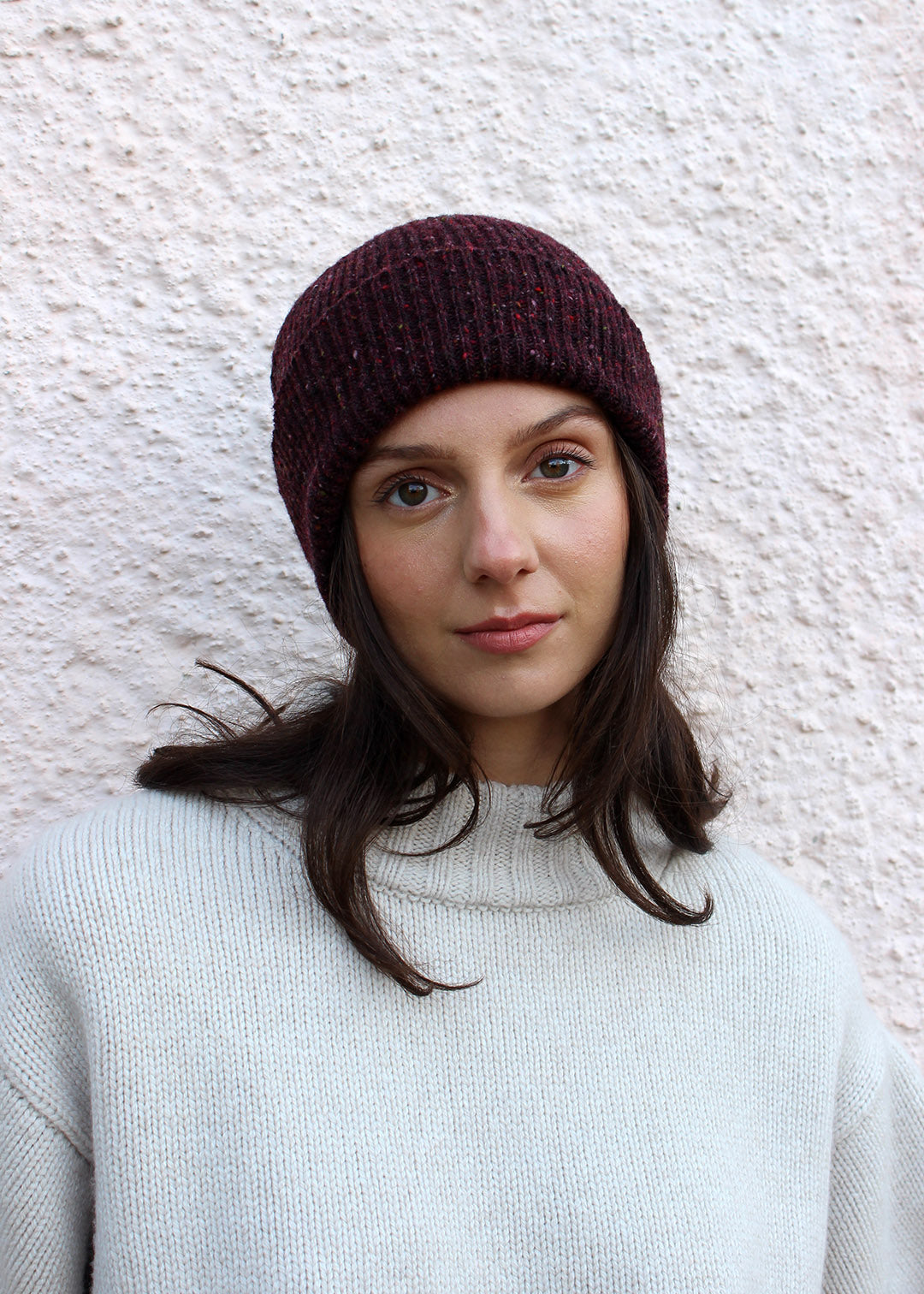 Wool ribbed beanie in flecked donegal burgundy. Scottish Textiles Showcase.