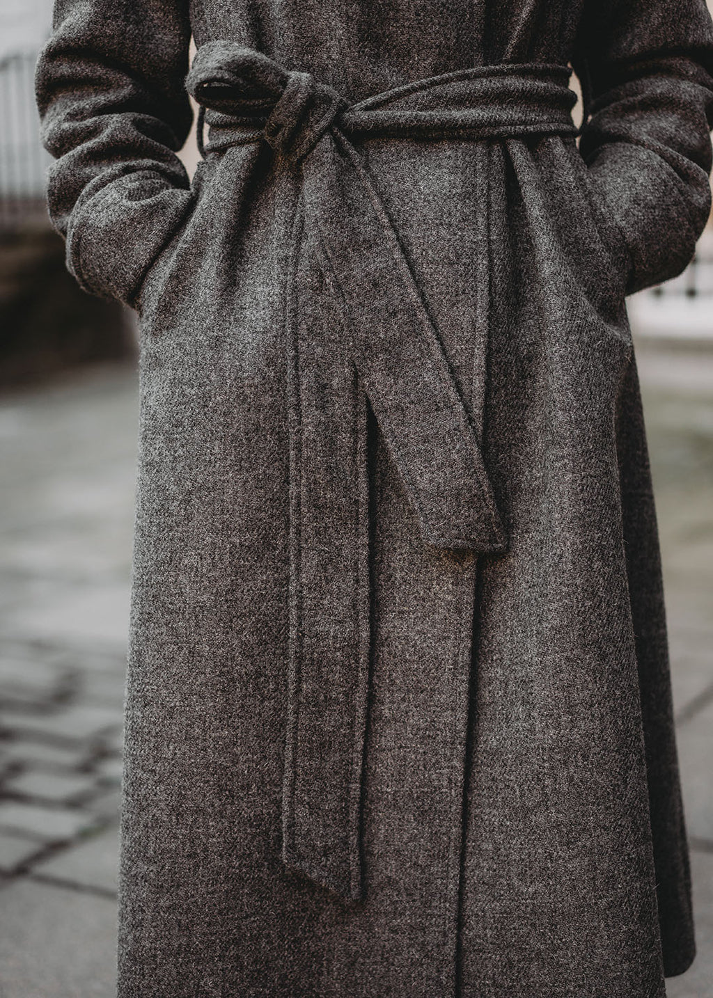 Harris Tweed cora coat in callanish grey shown on model. 