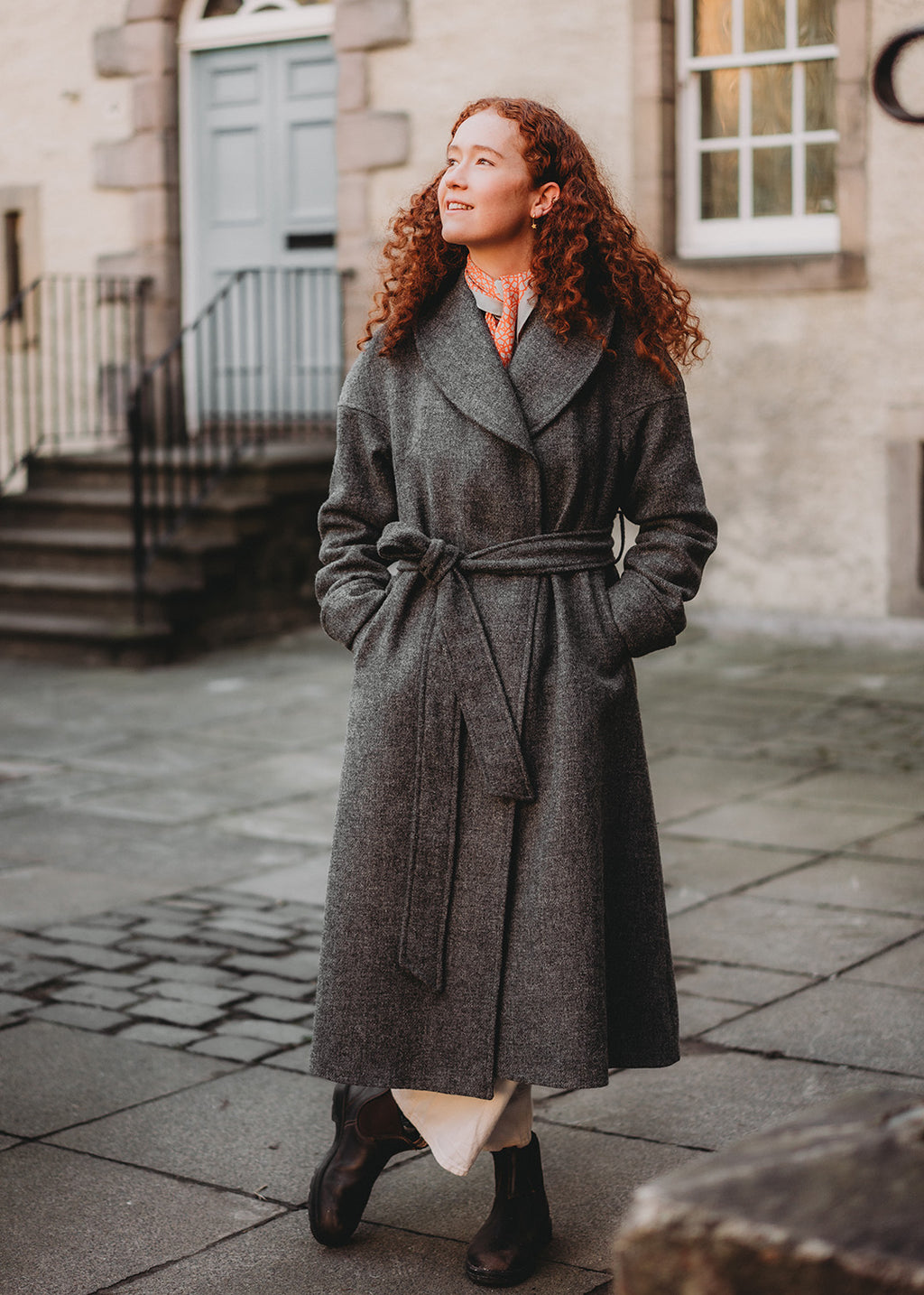 Harris Tweed cora coat in callanish grey shown on model. 