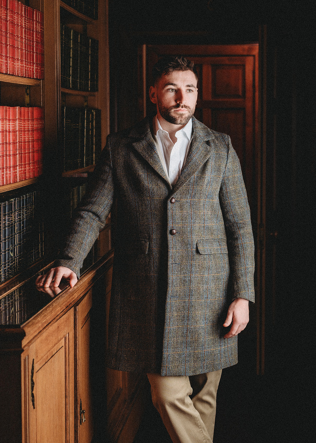 Men's Harris Tweed coat in brown herring with an overcheck.