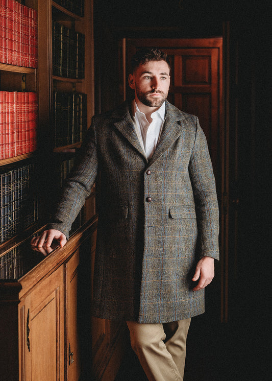 Men's Harris Tweed coat in brown herring with an overcheck.