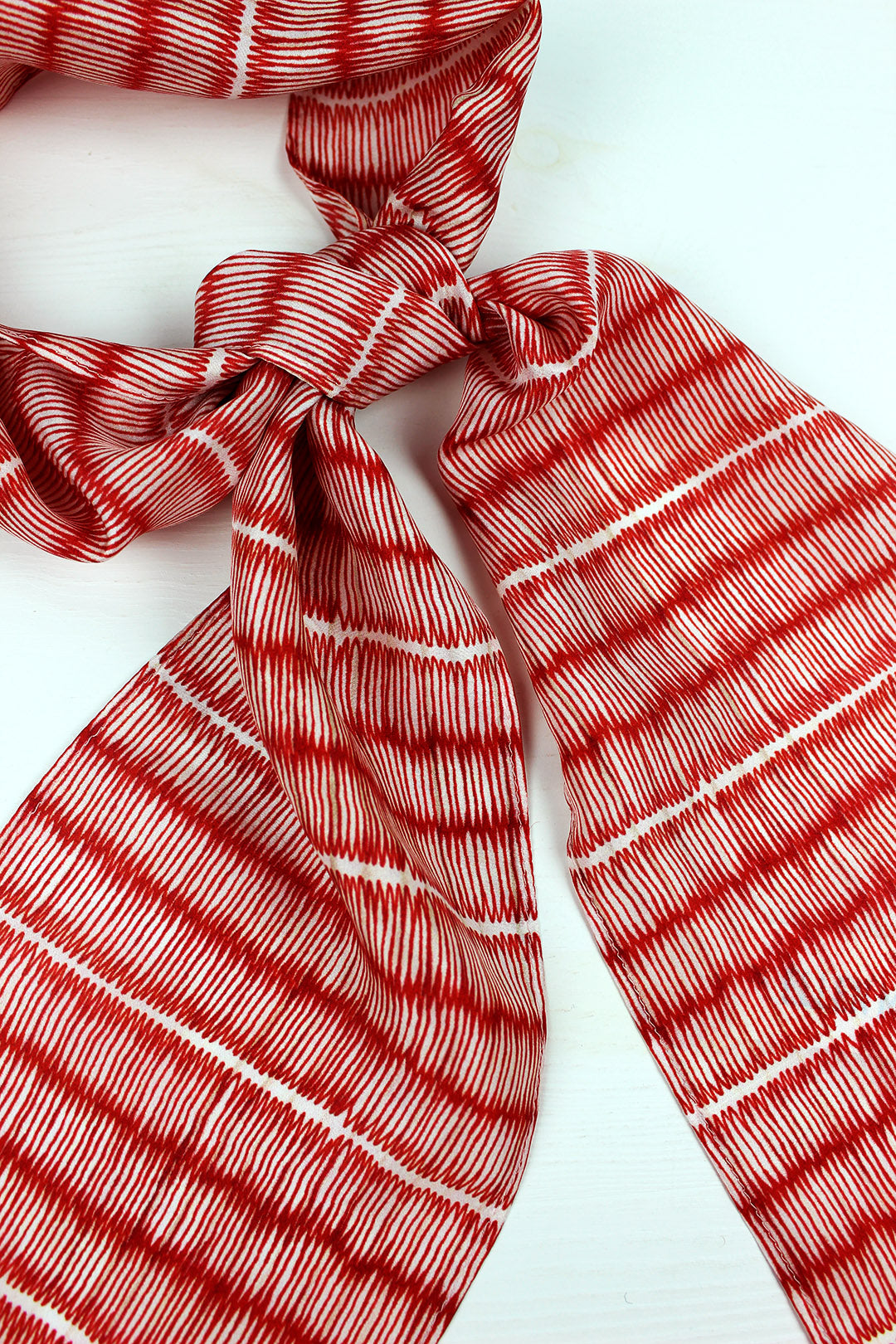 100% silk skinny width scarf digitally printed in Glasgow with Tatami design by Ellen Martin. Scottish Textiles Showcase.