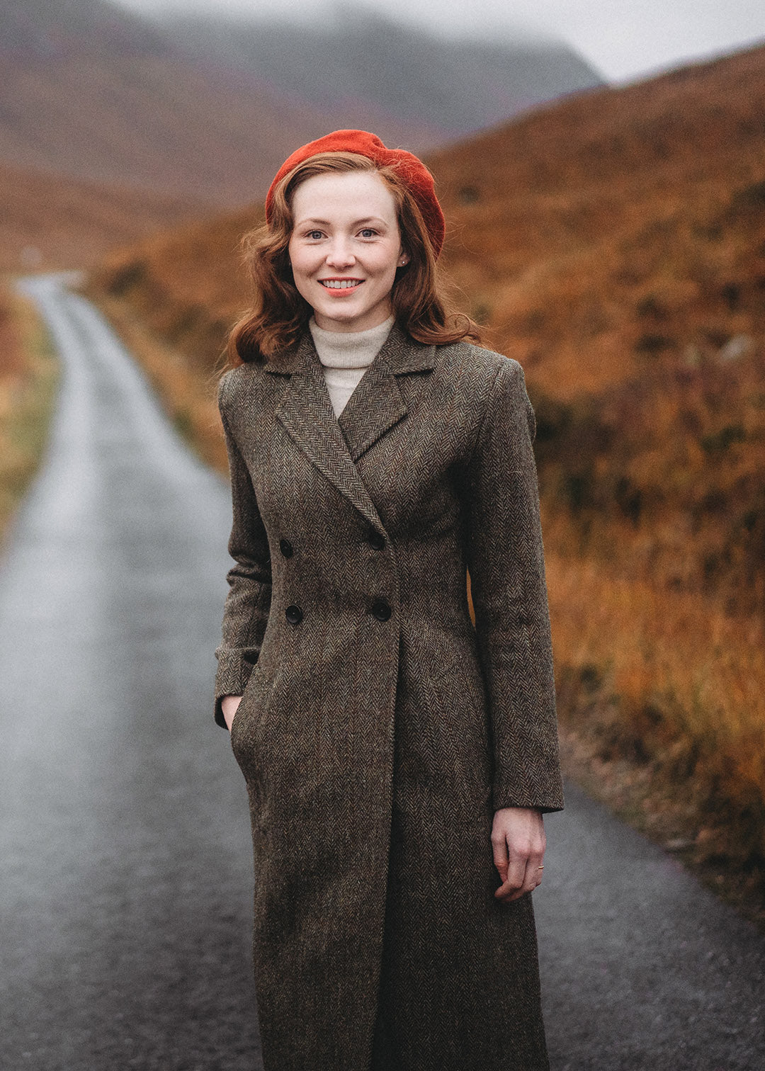 Harris Tweed Ellen coat in Autumn Herringbone photographed in Glencoe. Scottish Textiles Showcase.