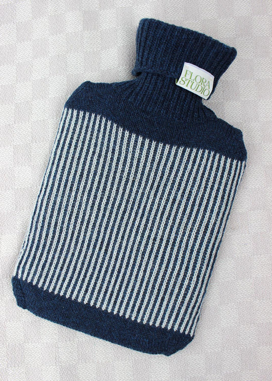 Striped hot water bottle cover in ocean blue.