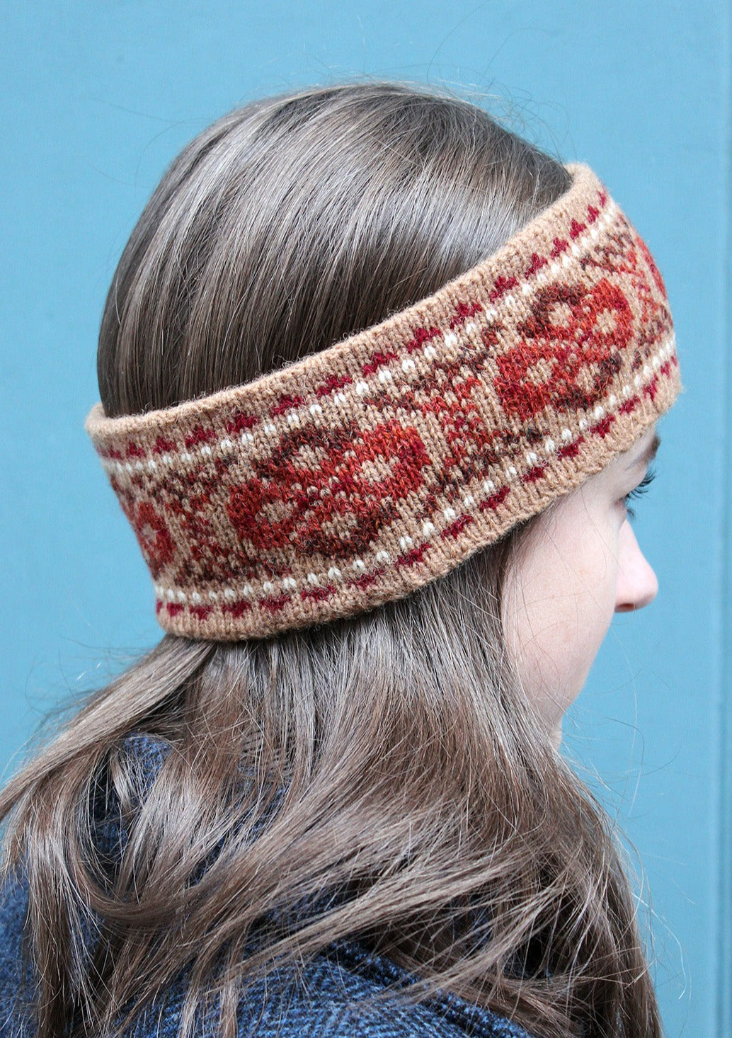 Hand knitted Fair Isle headband in shades of camel and red, made exclusively for the Scottish Textiles Showcase.