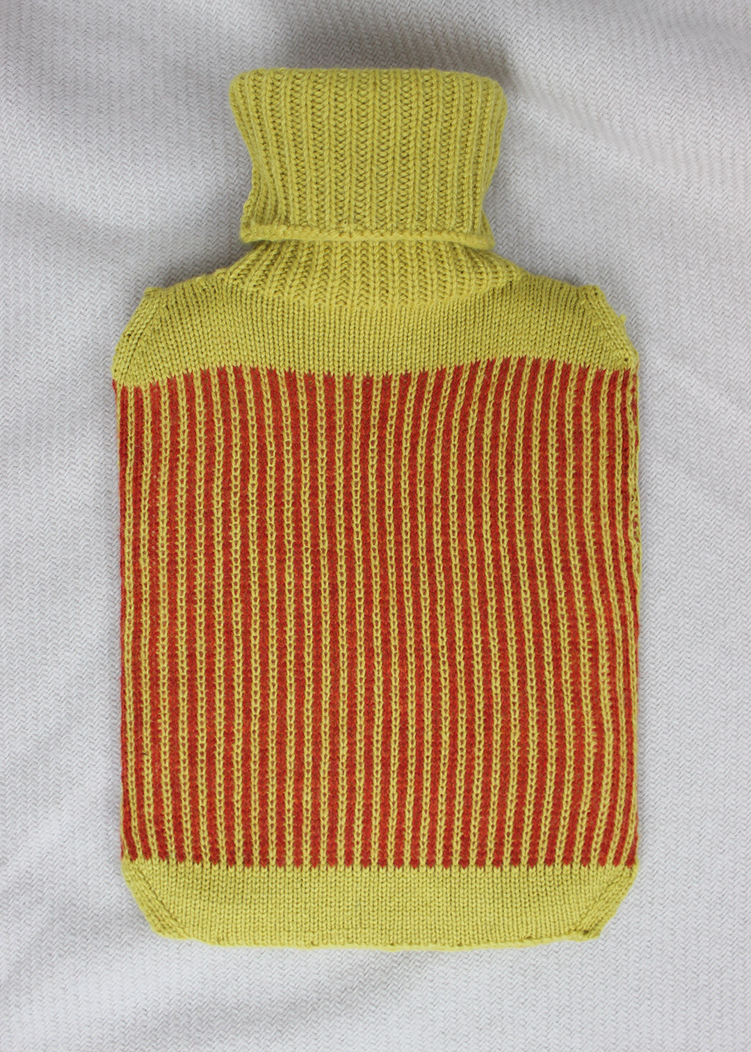 Lambswool striped hot water bottle. Scottish Textiles Showcase.