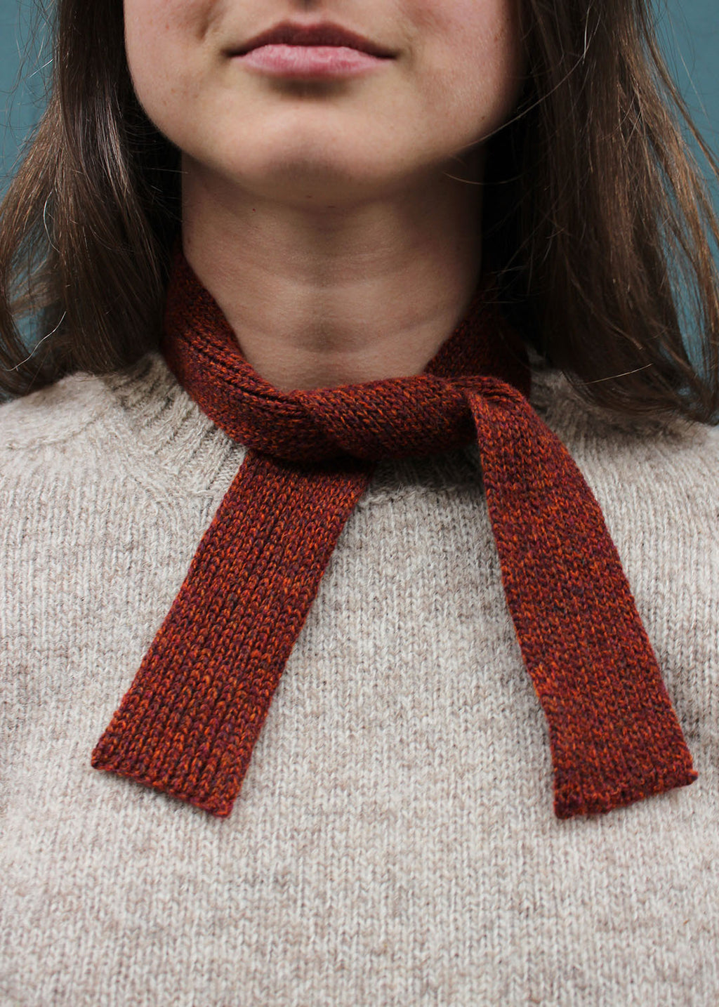 Wool knitted tie in rust. Scottish Textiles Showcase.