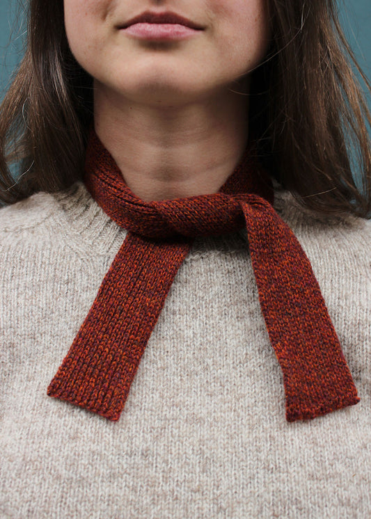 Wool knitted tie in rust. Scottish Textiles Showcase.
