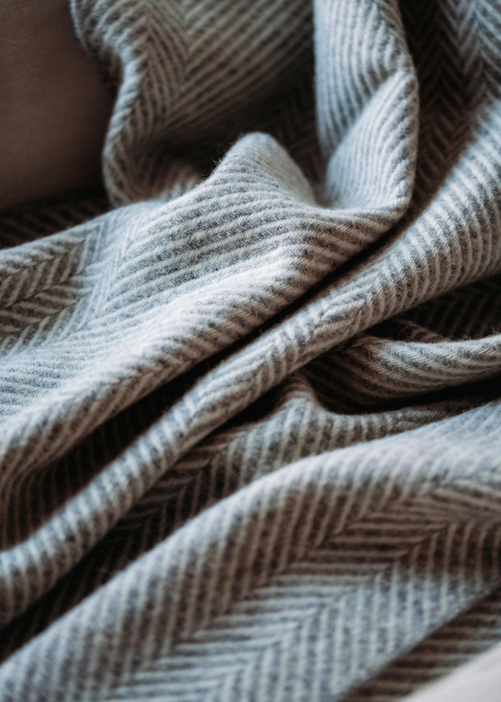 Jacob blanket woven in un-dyed grey and off-white wool.