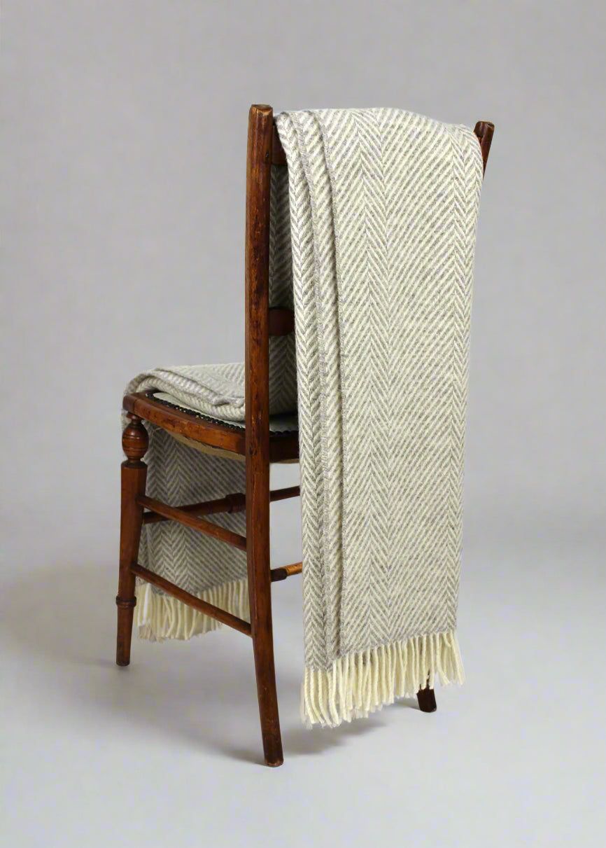 Silver Jacob blanket on chair. Scottish Textiles Showcase.