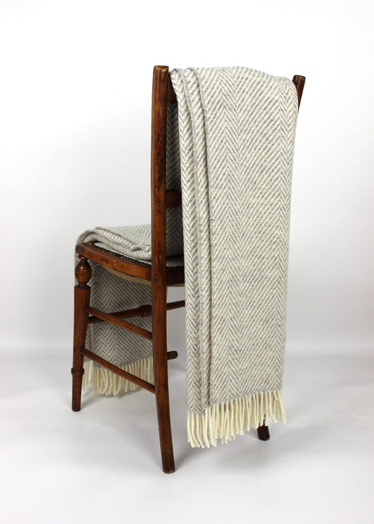 Silver Jacob blanket on chair. Scottish Textiles Showcase.