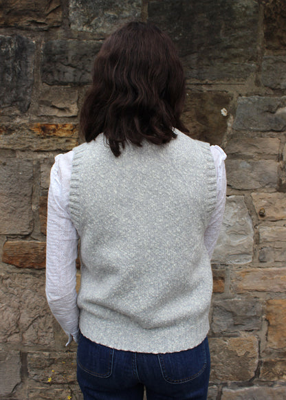 Knitted lambswool vest shown on model. Scottish Textiles Showcase.