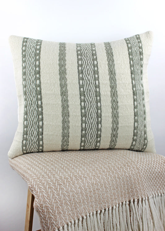 Limited edition, handwoven wool cushion in natural cream and sage green.