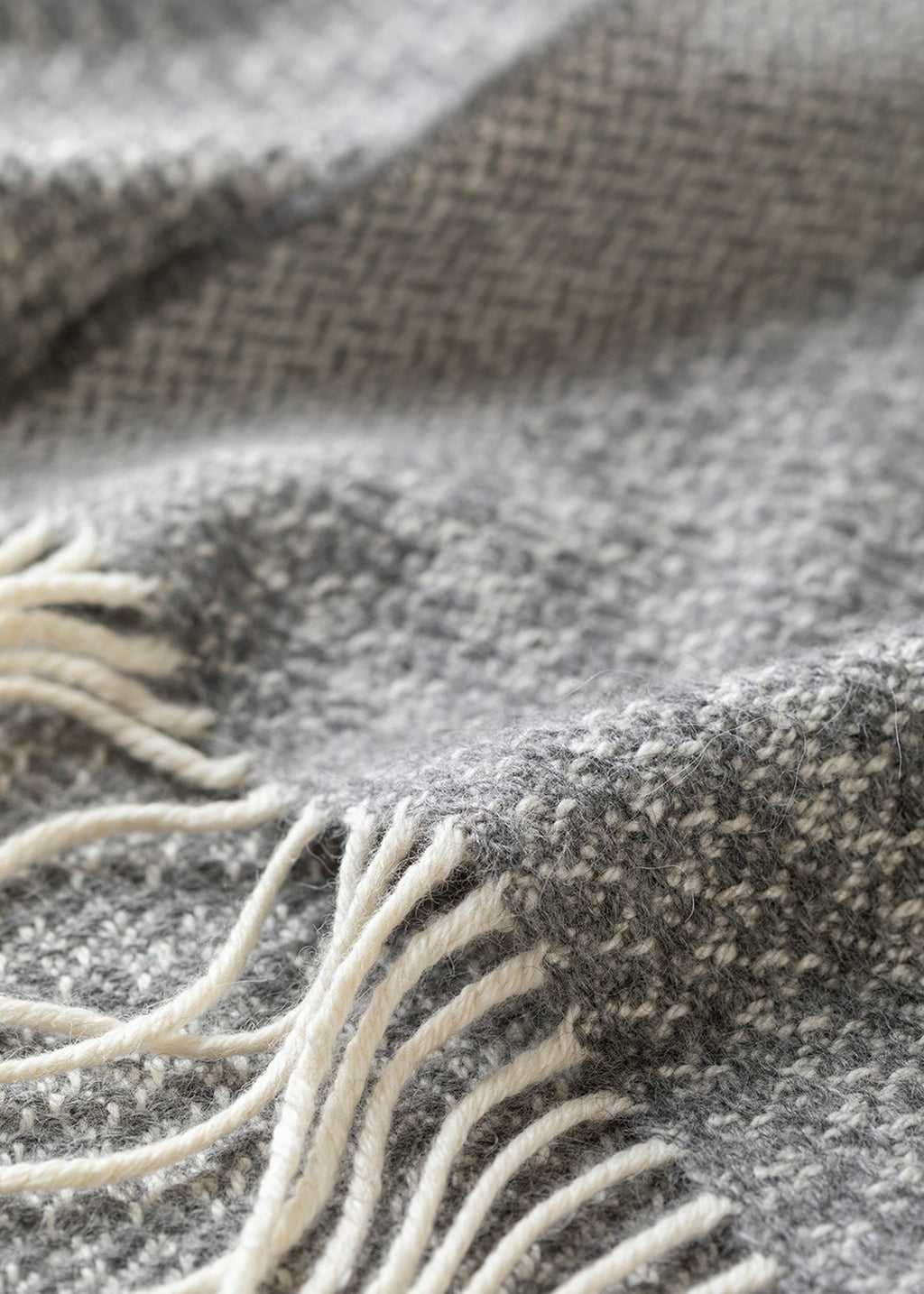 Un-dyed alpaca scarf in natural grey and off-white, woven in a harvest grain design.