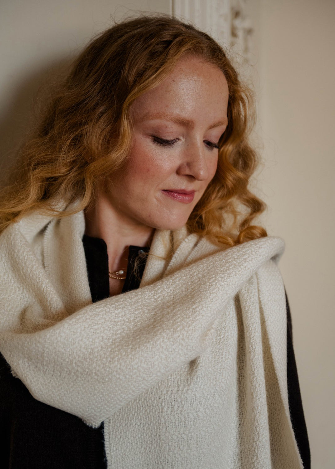 Un-dyed alpaca scarf in natural off-white, woven in a harvest grain design.