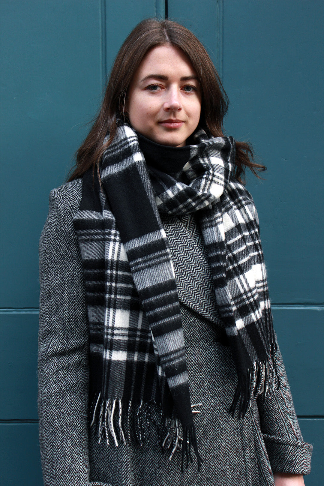 Luxurious pure cashmere stole in a classic black & white check, woven by cashmere specialists Johnstons of Elgin.