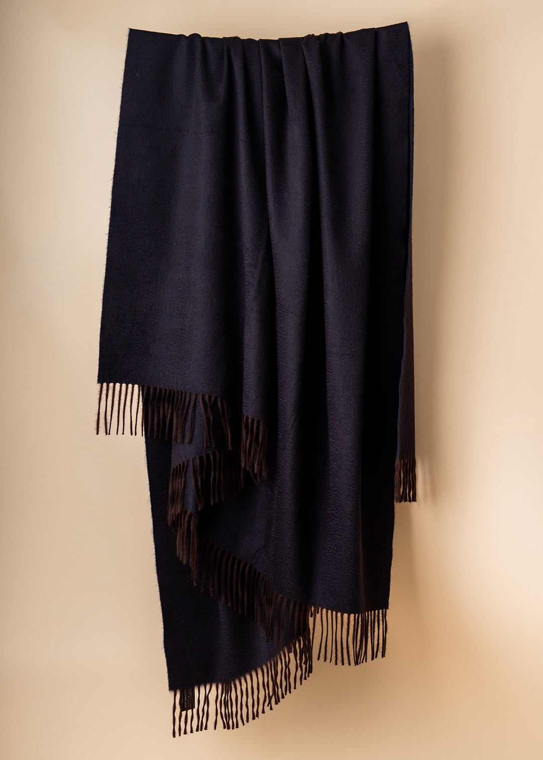 Deep aubergine purple cashmere throw.