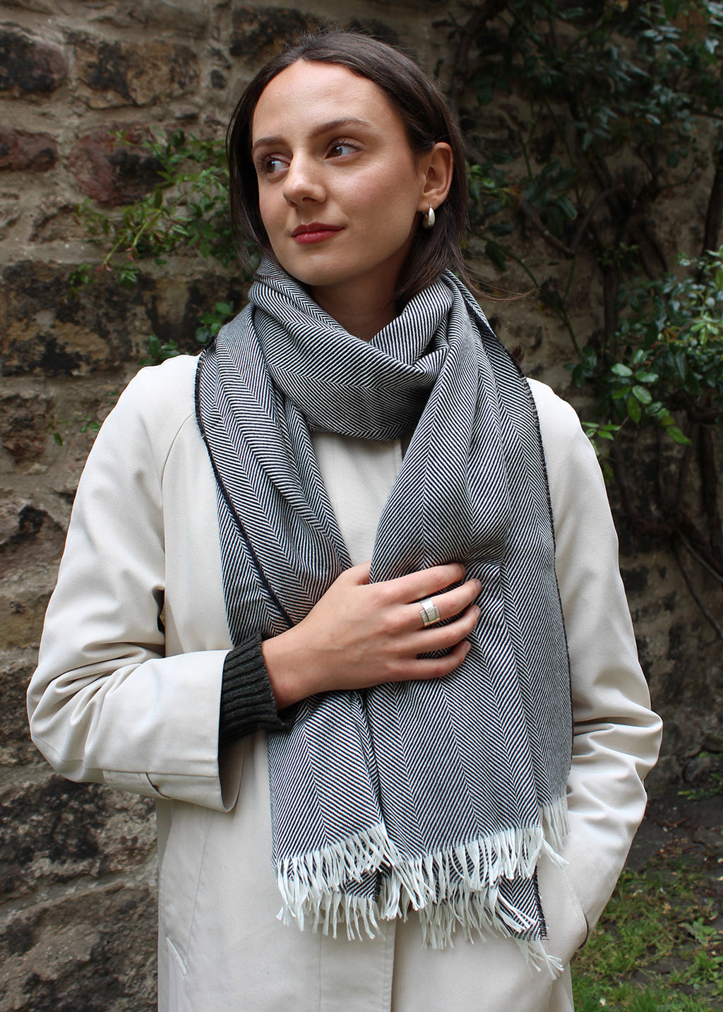 Silk and cashmere stole in graphite and white herringbone. 
