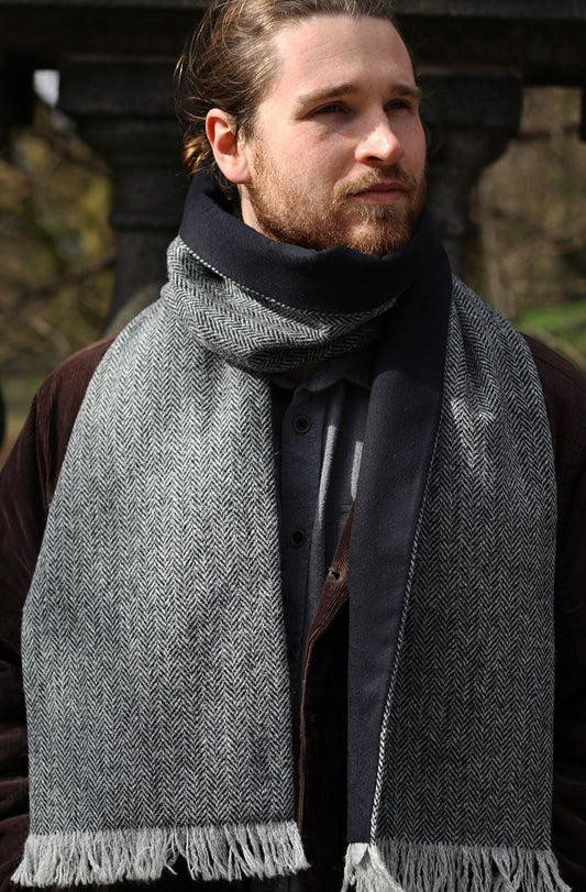 Scottish Textile Showcase Lusken scarf made with grey herringbone Harris Tweed and cashmere lining and pin fringe