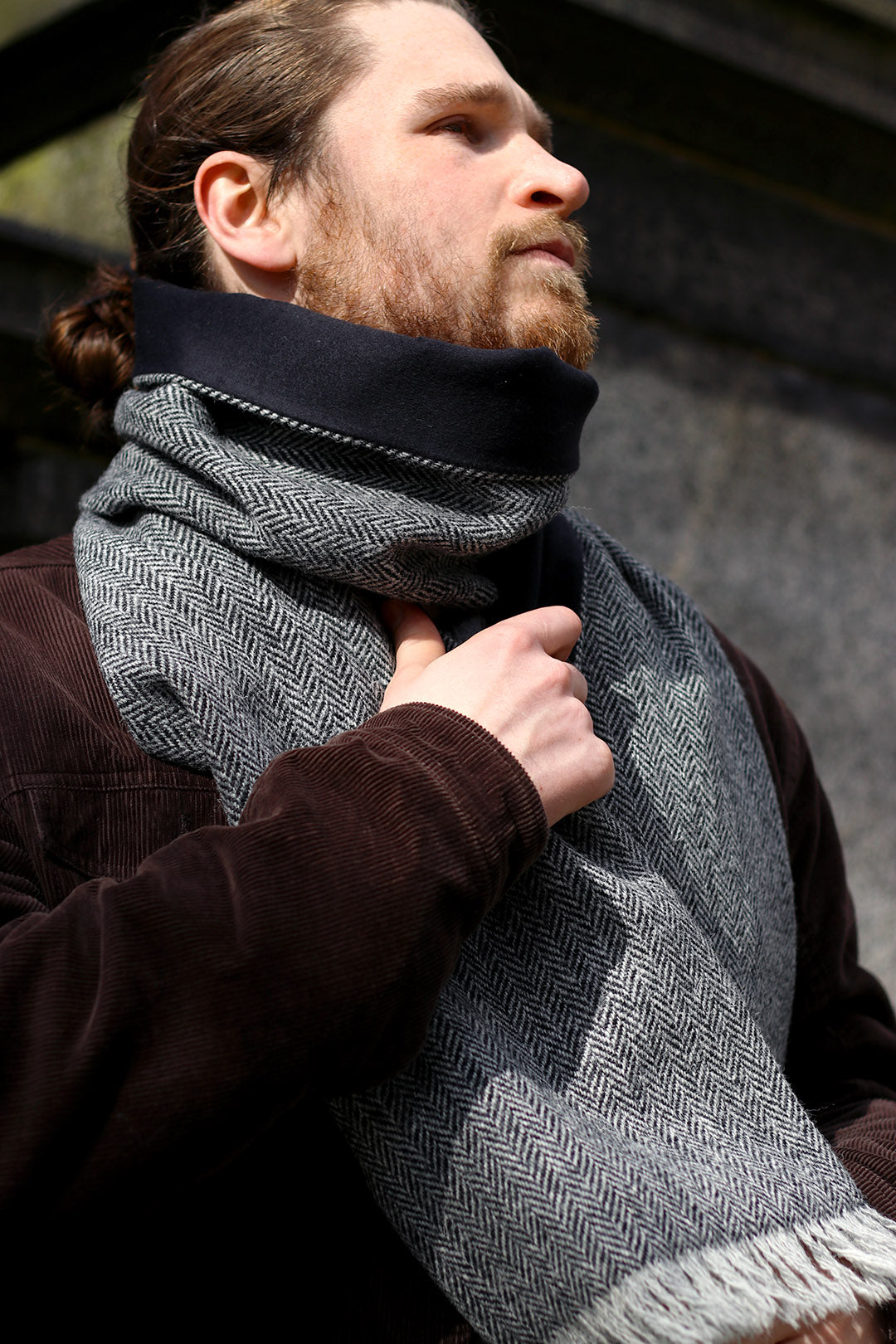 Scottish Textile Showcase Lusken scarf made with grey herringbone Harris Tweed and cashmere lining and pin fringe