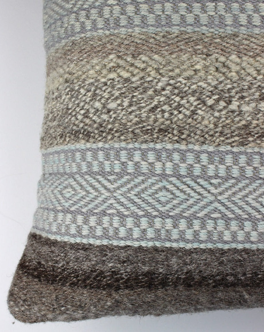 Handwoven cushion with grey and pale blue stripes, with grey reverse. Scottish Textiles Showcase.