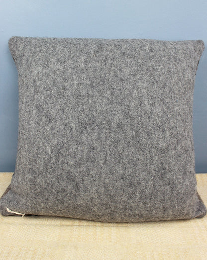 Handwoven cushion with grey and pale blue stripes, with grey reverse. Scottish Textiles Showcase.