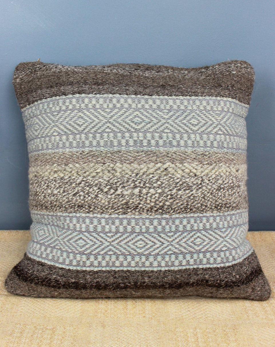 Handwoven cushion with grey and pale blue stripes. Scottish Textiles Showcase.