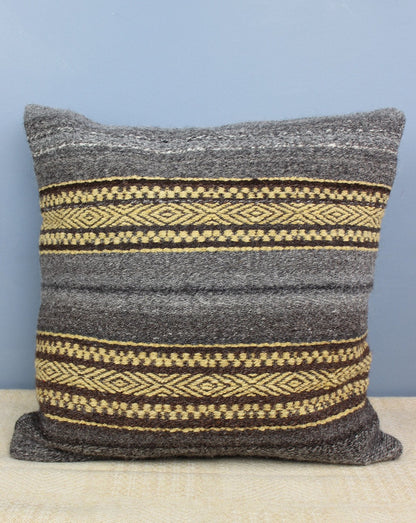 Handwoven grey, yellow and brown striped cushion. Scottish Textiles Showcase.