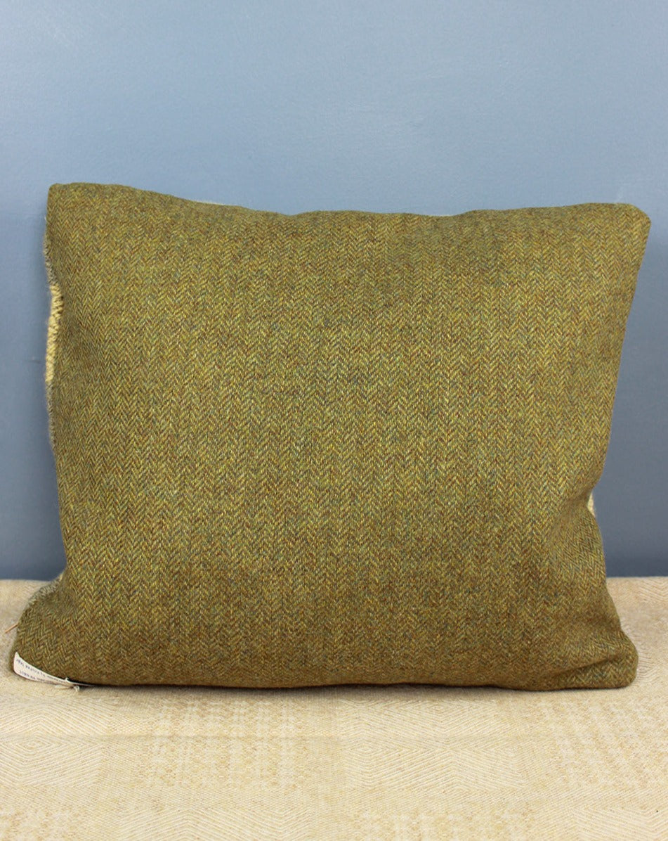 Handwoven cushion with green and yellow stripes, with green reverse. Scottish Textiles Showcase.