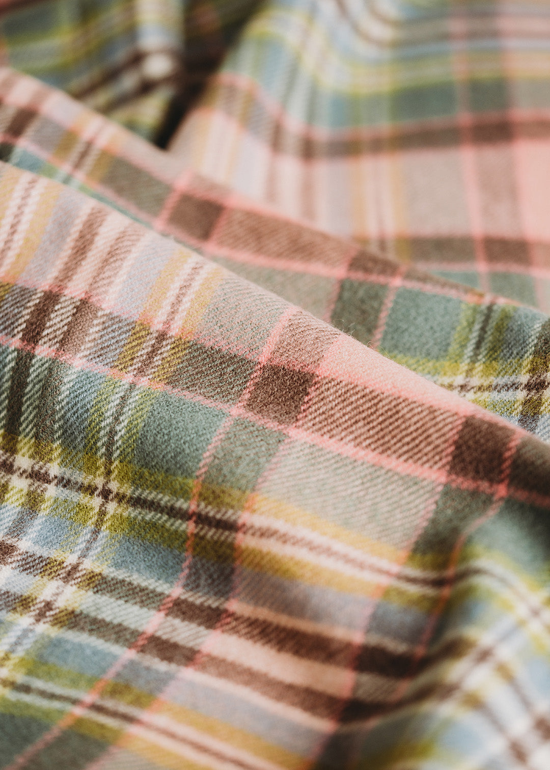 Lambswool blanket woven in Dundee Rose tartan.