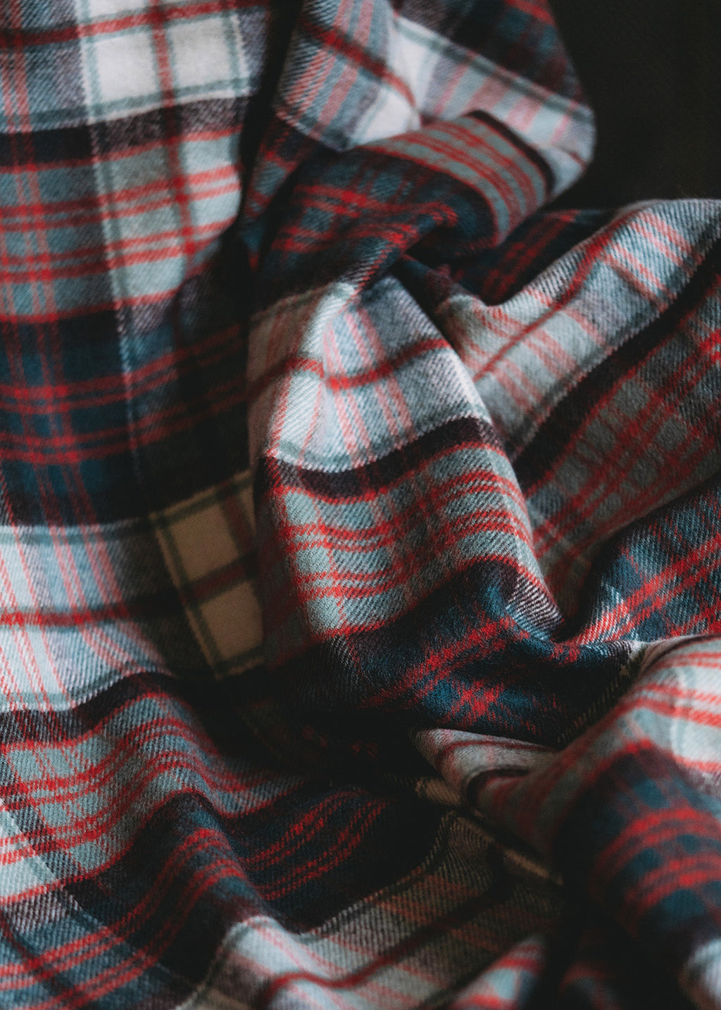Lambswool blanket woven in MacDonald Dress tartan.