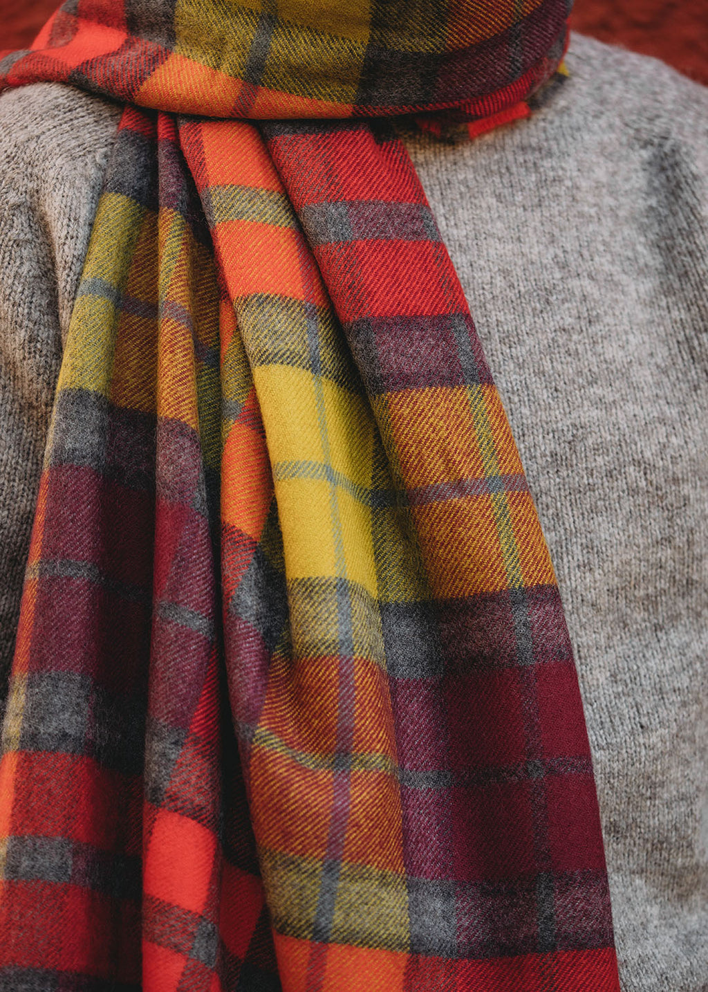 Lambswool tartan blanket stole in Buchanan Berry tartan. 