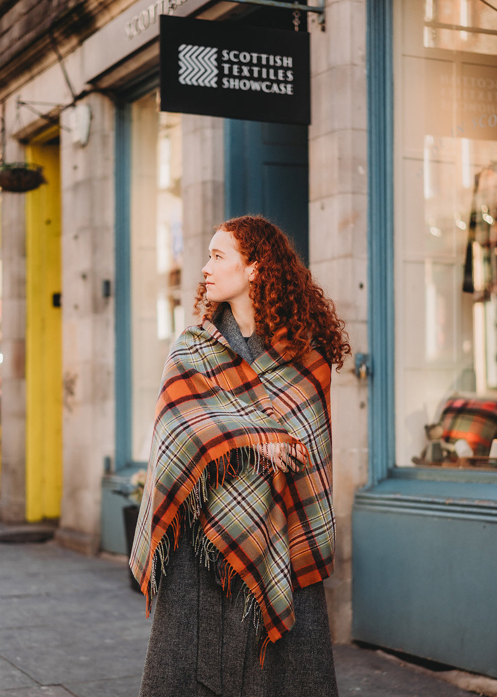 Lambswool tartan blanket sole in Dundee Old Weathered tartan. 