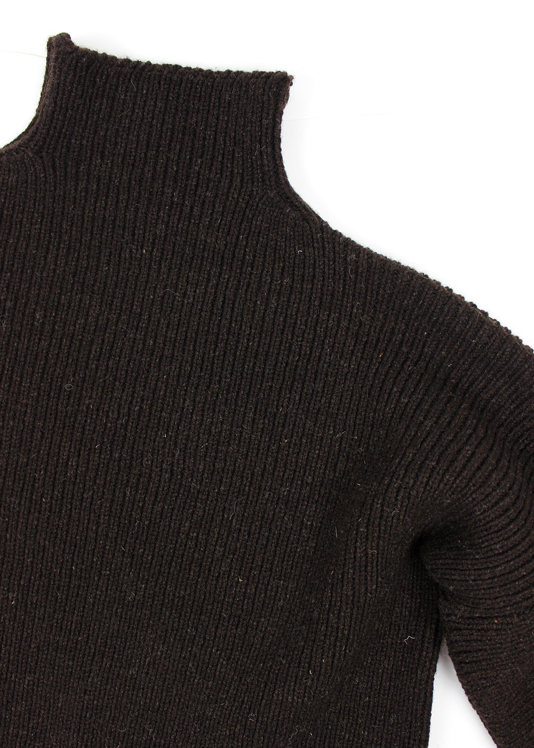 Luxury hand frame knitted jumper made with un-dyed, dark brown wool from Shetland sheep.