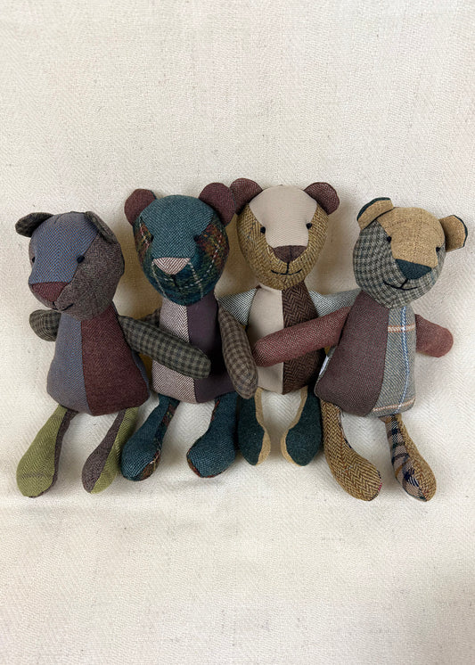 Tweed patchwork bear in browns, greens and oranges. Scottish Textiles Showcase.