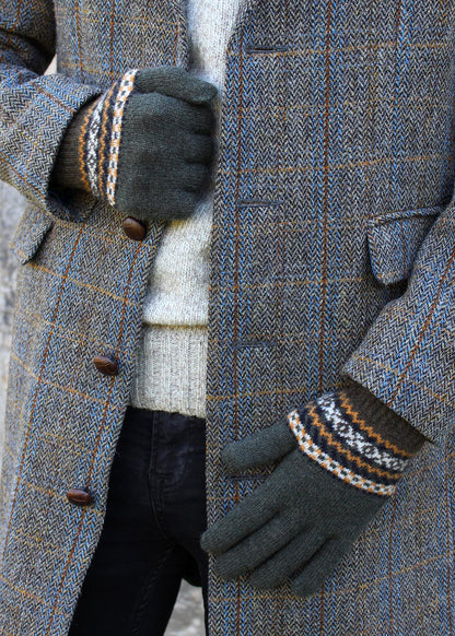 Fairisle mens gloves shown on model. Scottish Textiles Showcase.