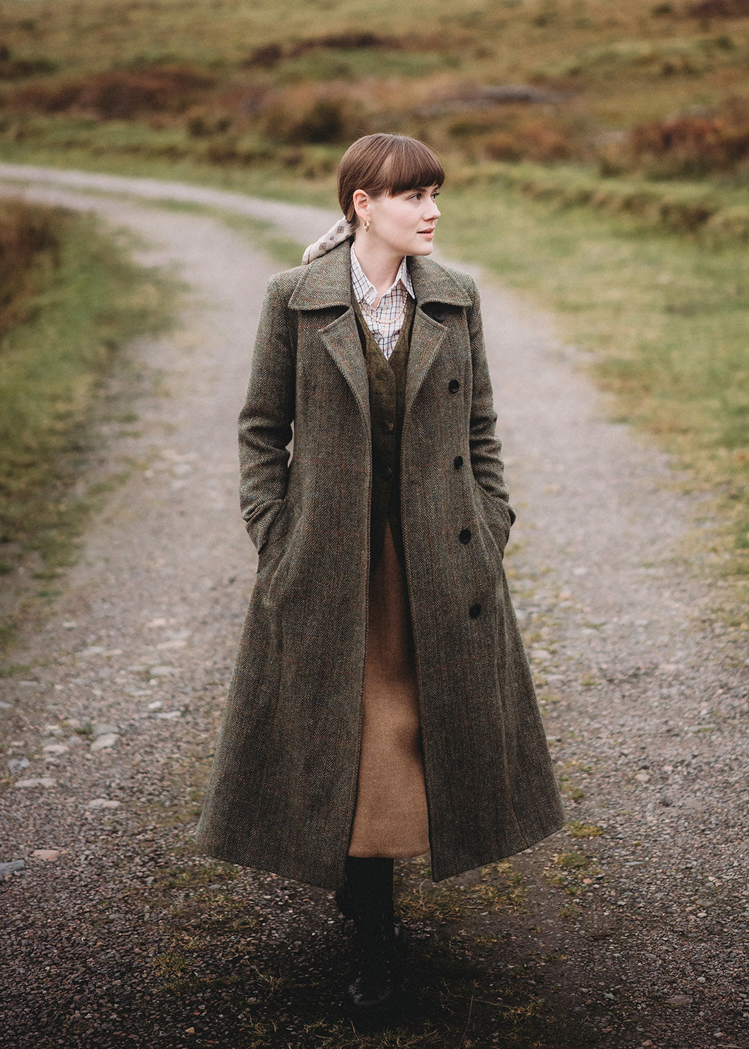 Harris Tweed Marta coat photographed in Glencoe. Scottish Textiles Showcase.