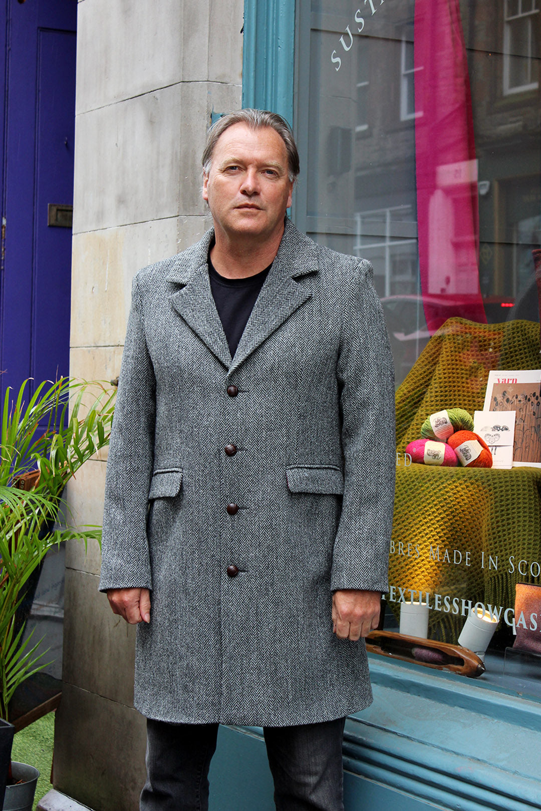 Mens Harris tweed coat in grey herringbone, Scottish textiles showcase
