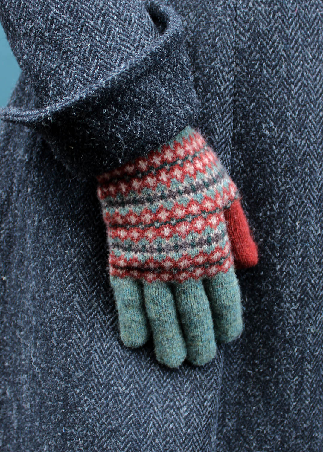 Lambswool gloves in green and red fairisle pattern.