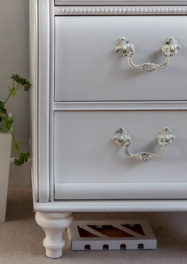 moth box in position under chest of drawers