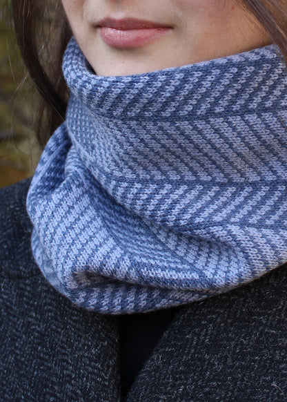 Merino lambswool neck warmer in shades of blue-grey with a design inspired by the glass roof of Waverley Railway Station in Ed