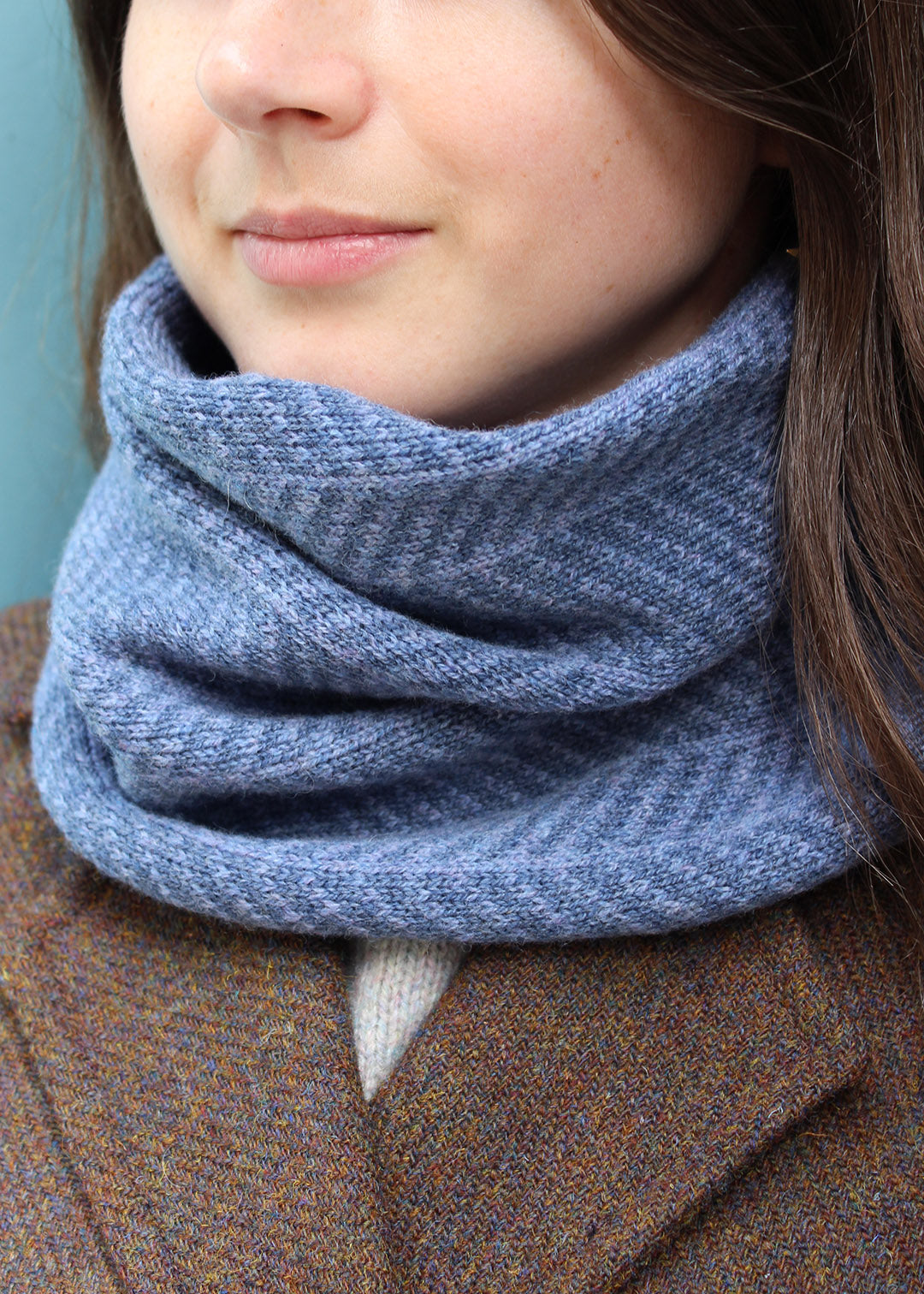 Merino lambswool neck warmer in shades of blue-grey with a design inspired by the glass roof of Waverley Railway Station in Edinburgh.