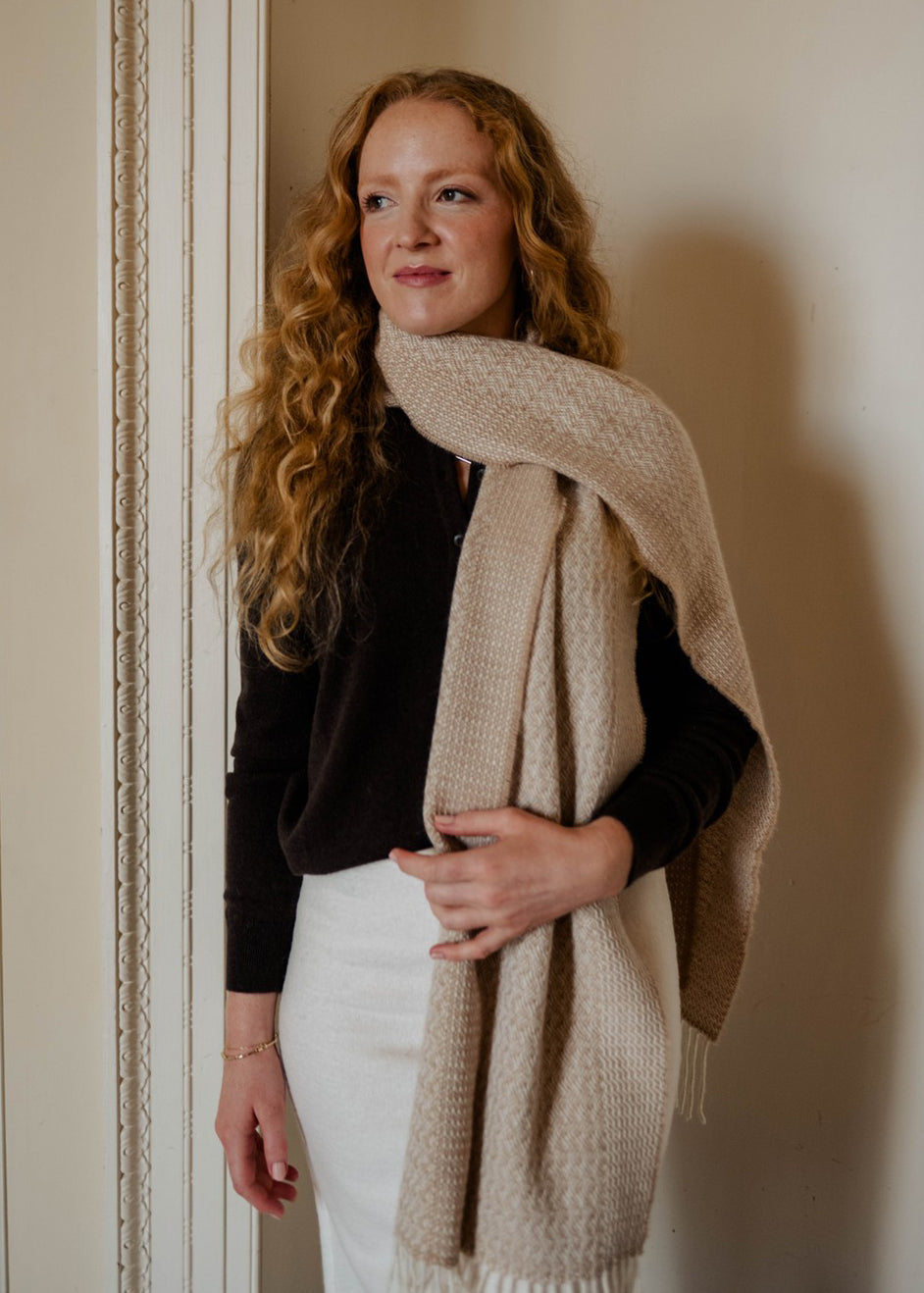 Un-dyed alpaca scarf in warm caramel and off-white, woven in an intricate rippling barley design.