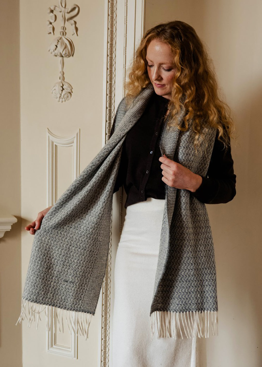Un-dyed alpaca scarf in grey and off-white, woven in a rippling barley design.