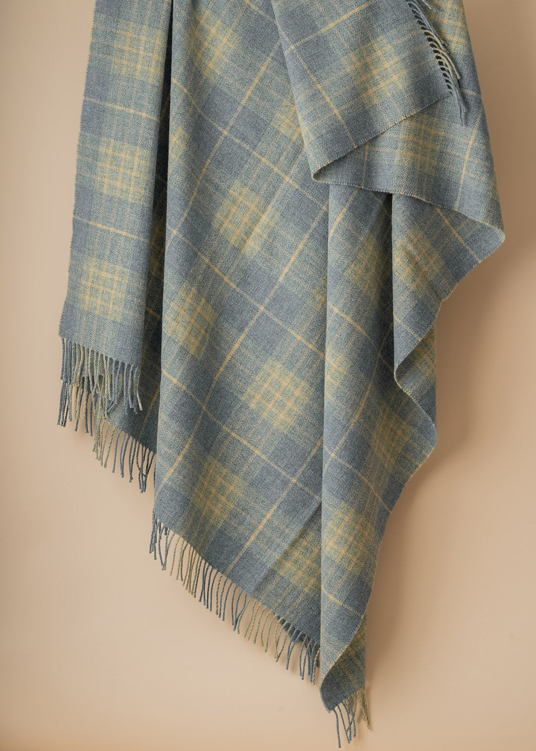 Scottish lambswool throw woven in pale blue and green Robert Carver colourway.